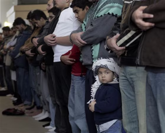U.S. Muslims are waging a debate about how much English they can use inside mosques without violating Islamic law or losing the authenticity of their faith.
